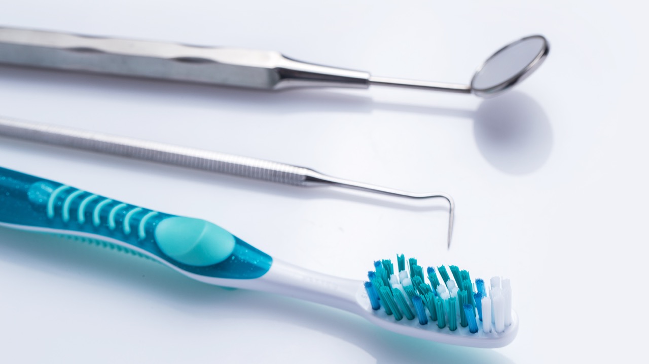Dental hygiene instruments and a toothbrush